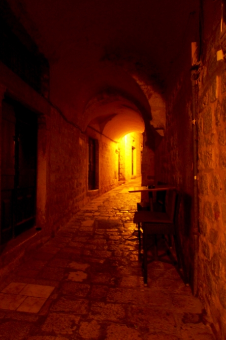 Dubrovnik's old city is full of narrow, winding alleys and mysterious torch-lit passageways